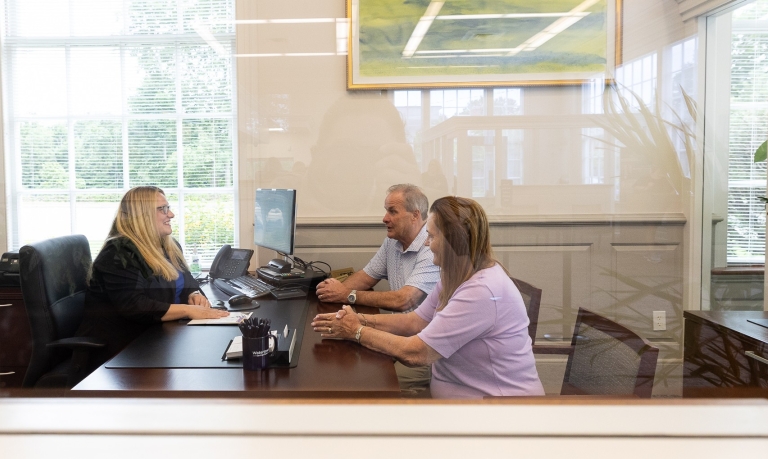 Business customers meeting with a Personal Banker at Watertown Savings Bank.