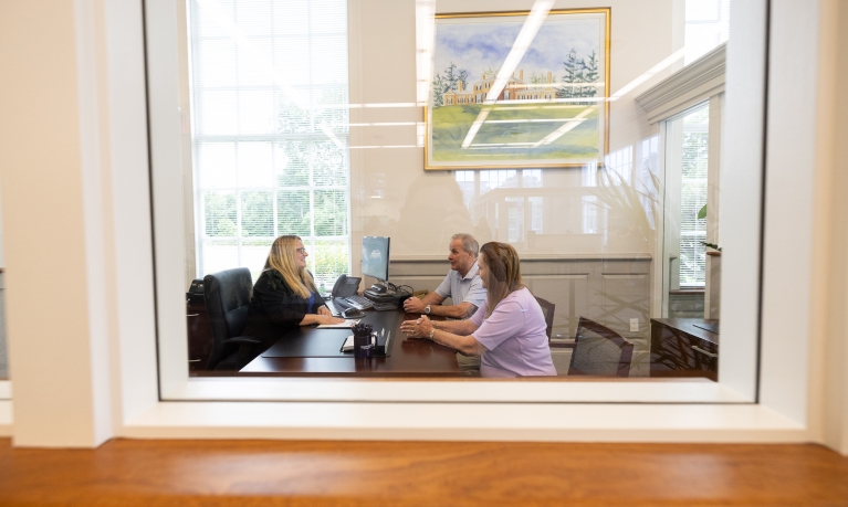 Business customers meeting with a Personal Banker at Watertown Savings Bank.