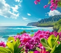 Pacific ocean with mountains in the background and pink flowers in the foreground.