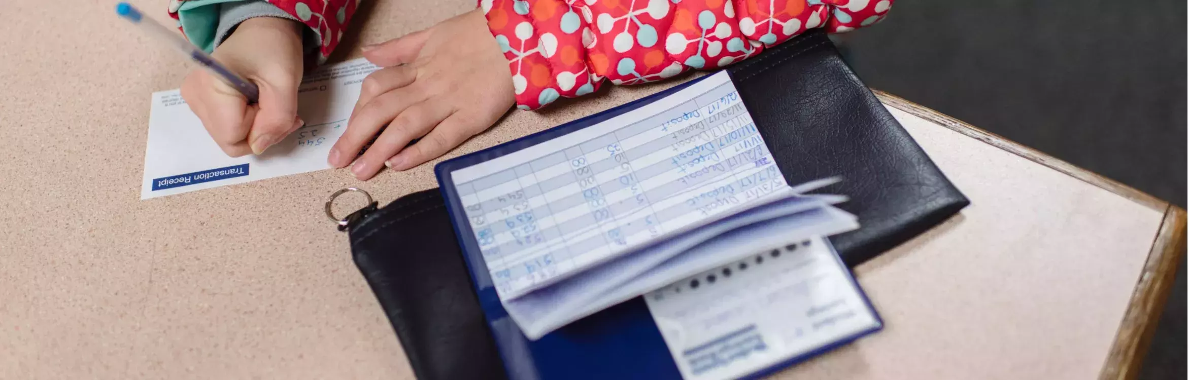 Student making a deposit during the School Banking Program