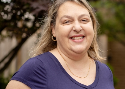 Parents checking their bank accounts on the WSB Mobile Banking app.