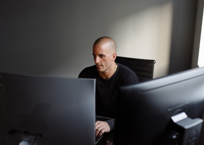 Business customer working on his computer.